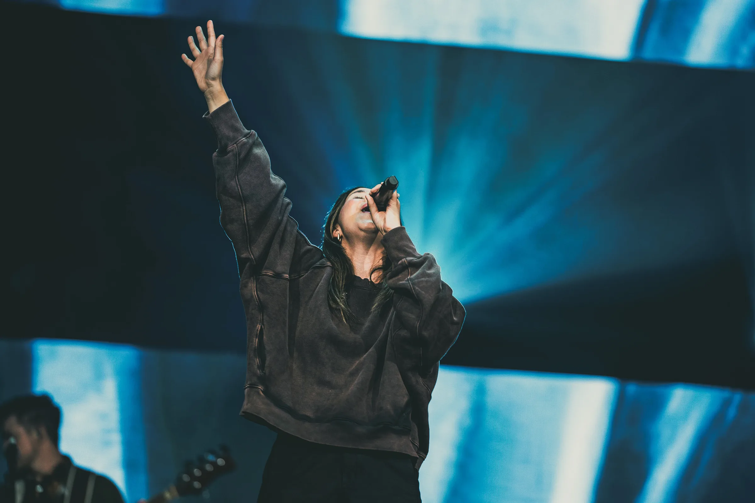A Champion Forest worship leader singing